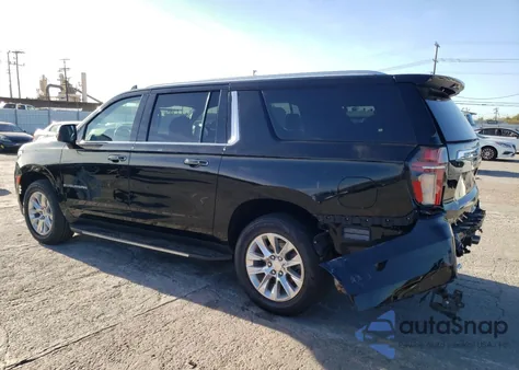 2021 Chevrolet Suburban C1500 Premier z USA, uszkodzony, nr VIN 1GNSCFKD9MR313379